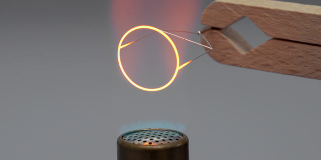 Fig. 4: The ring is annealed inside the flame of a Bunsen burner.