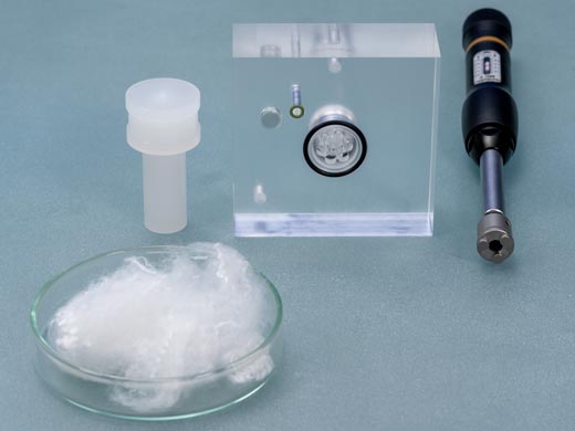 Measuring cell for fibers, powders, granulate material